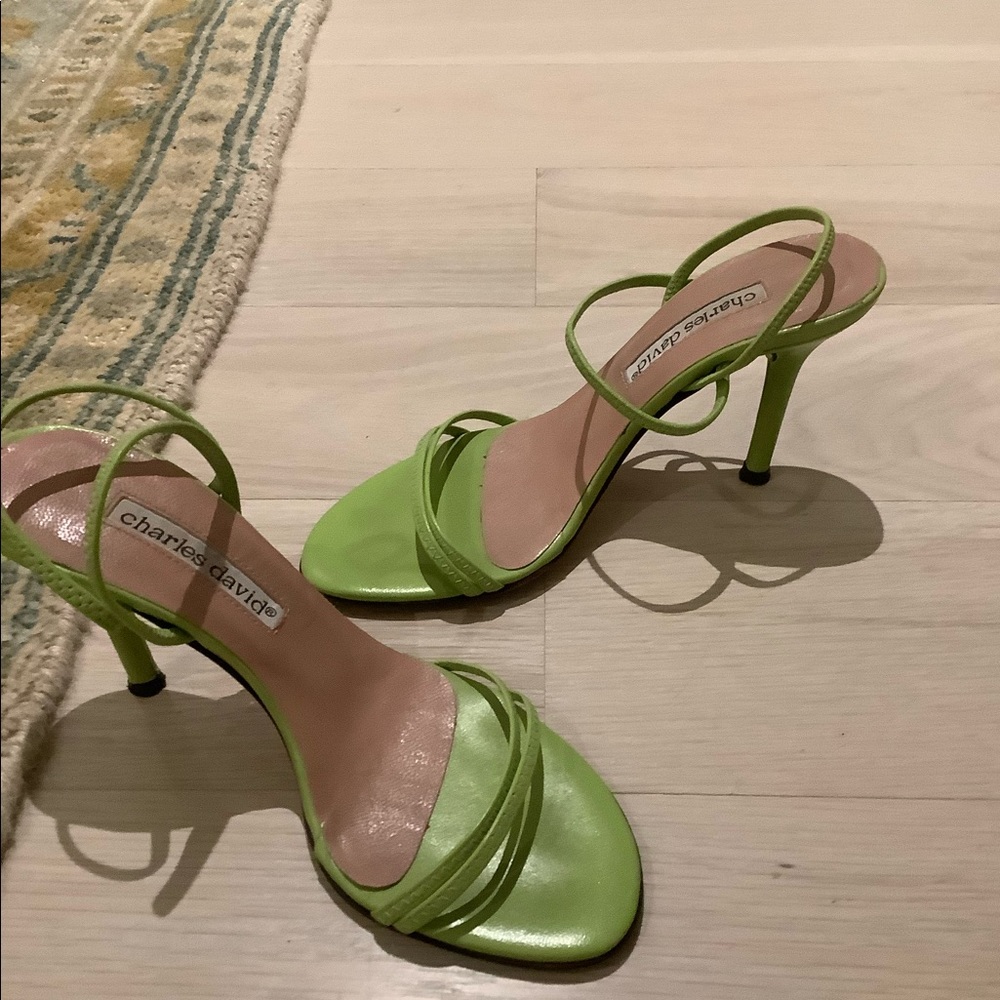 Green sandals worn